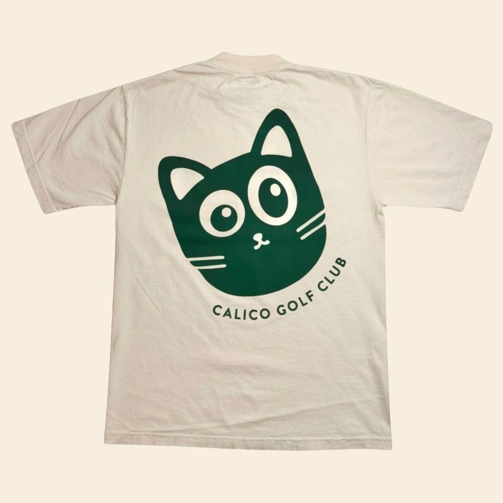 Calico Golf cream 100% USA cotton t-shirt. Garment dyed for a lived in feel. Relaxed unisex fit.
